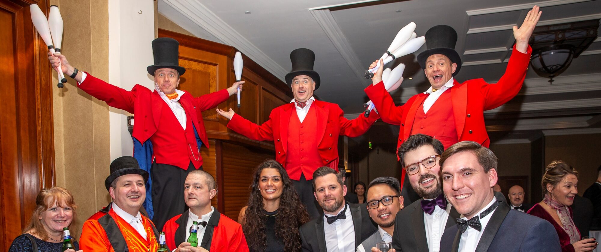 stilt walkers providing corporate entertainment at event.