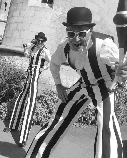 Comedy stilt walkers and jugglers